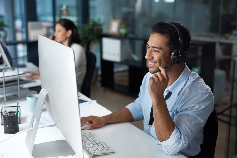 Employee helping customers over the phone