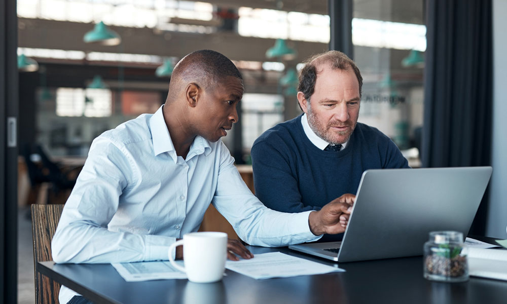 IT support staff with client